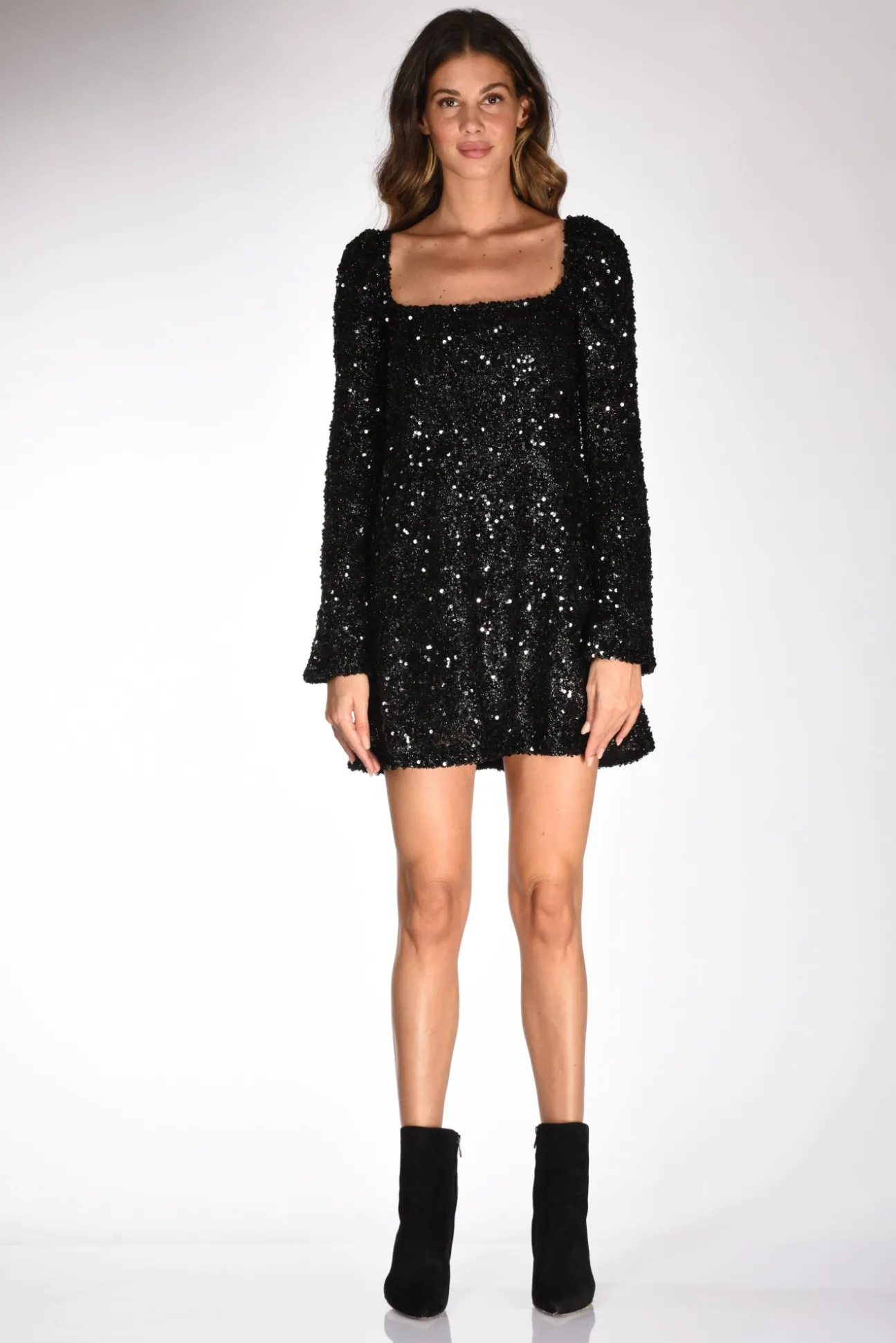 abito_paillettes_nero_1.webp abito paillettes nero